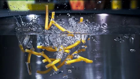 Macaroni Pasta Falling Down in to the pot Super Slow motion 1000 fps Stock Footage 130931705