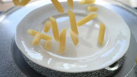 Macaroni Pasta Falling Down in to the pot Slow motion Видео 136364770