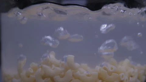 Macaroni pasta in pot with boiling water  Stock Footage 149705116