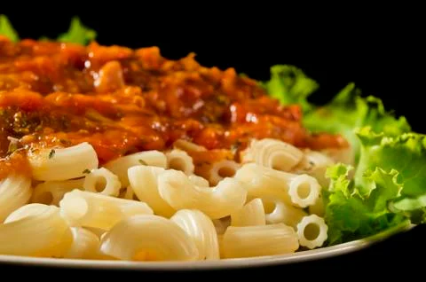 Macaroni  with sauce Stock Photos