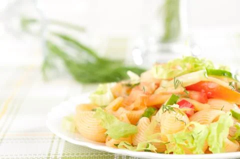 Macaroni with vegetables Stock Photos