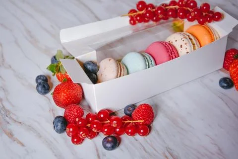 Macaronis in a white box with a transparent window. Color dessert, pink, mi.. 写真素材