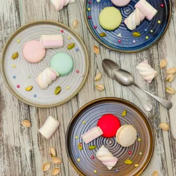 Macarons and marshmallows, top view Stock Photos