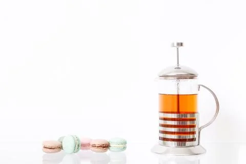 Macarons and tea Stock Photos