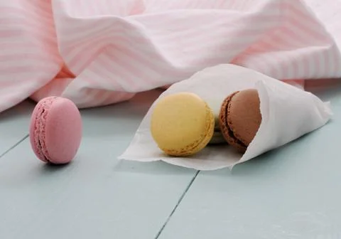Macarons in backing paper cornet Stock Photos