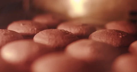 Macarons baking. Confectionery Preparation Process. Chef A Batch Of Cakes Stock Footage 150208147