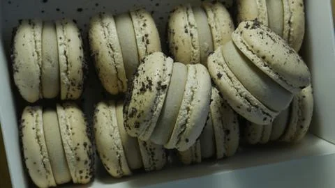 Macarons cake lie in a beige box Stock Photos