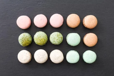 Macarons cake, top view flat lay, pattern macaroon, black background 스톡 사진