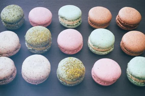 Macarons cake, top view flat lay, pattern macaroon, black background 스톡 사진