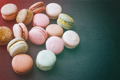 Macarons cake, top view flat lay, pattern macaroon, black background 스톡 사진