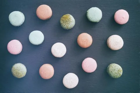 Macarons cake, top view flat lay, pattern macaroon, black background 스톡 사진