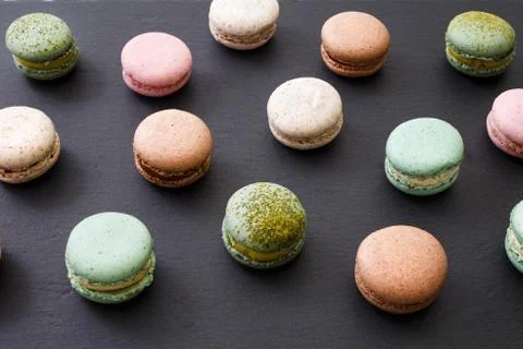 Macarons cake, top view flat lay, pattern macaroon, black background 스톡 사진
