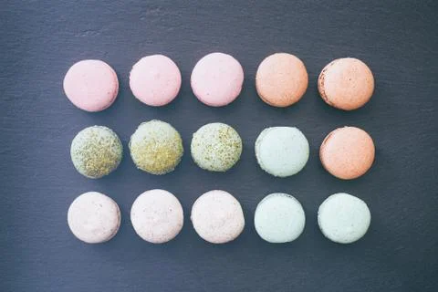Macarons cake, top view flat lay, pattern macaroon, black background 스톡 사진