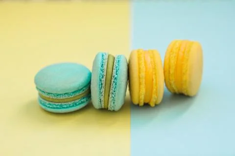 Macarons cake, top view flat lay, handmade pattern on yellow and blue backgro Stock Photos