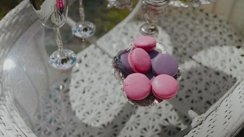 Macarons Cakes On a Glass Table. Close-up of birthday cakes. Stock Footage 139304540