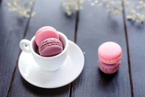 Macarons in cup Stock Photos