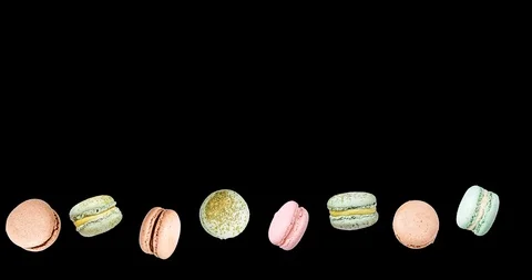 Macarons frame, fly falling macaroon. Alpha Channel Stock Footage 97943805