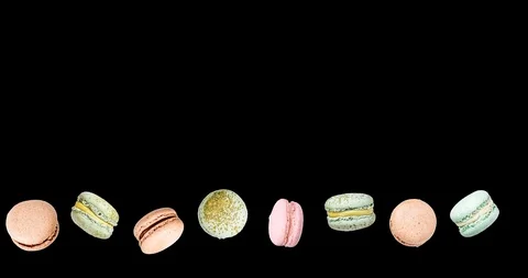 Macarons frame, fly falling macaroon. Alpha Channel Stock Footage 97957164