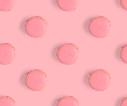 Macarons seamless pattern. macarons isolated on pink background. Foto stock