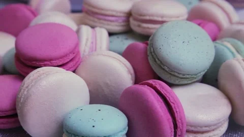 Macarons on the table in different colors. Festive delicious dessert Stock Footage 200022692