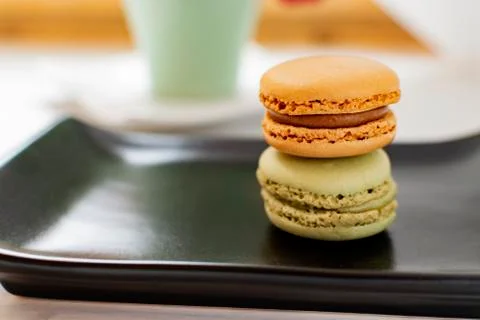 Macarons with tea. Stock Photos