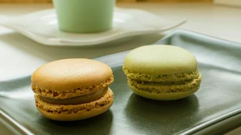 Macarons with tea. Stock Photos