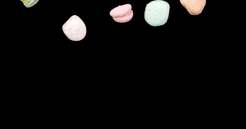 Macarons turbulent cake, fly falling macaroon. Alpha Channel Stock Footage 97927664