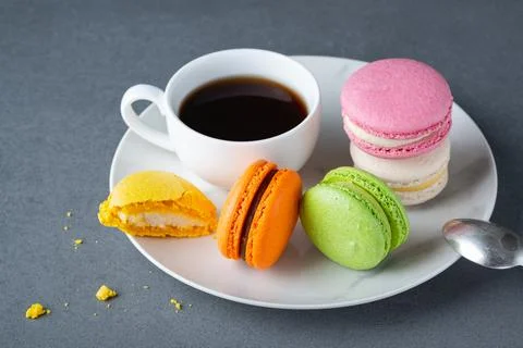 Macaroon and a cup of coffee Stock Photos