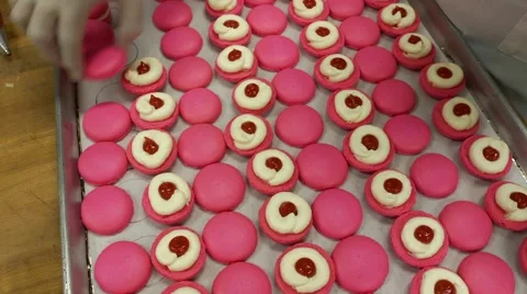 Macaroon assembly wide shot pink 2 Stock Footage 50804094
