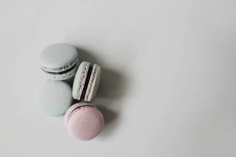 Macaroon or macaron biscuits on grey background. Stock Photos
