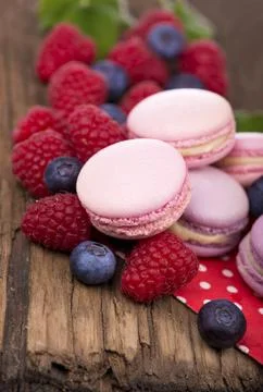 Macaroon on a wooden background Stock Photos