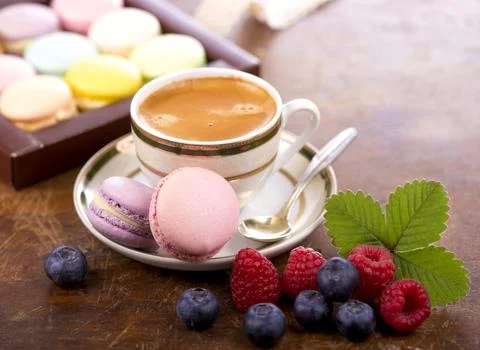 Macaroon on a wooden background Stock Photos