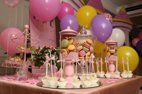 Macaroons and balloons Stock Photos