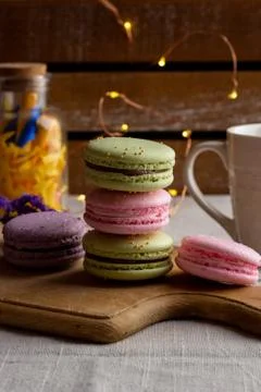 Macaroons and cup of coffee Stock Photos