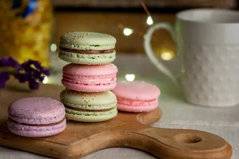 Macaroons and cup of coffee Stock Photos