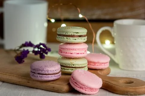 Macaroons and cup of coffee Stock Photos