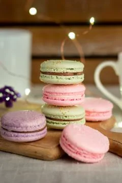 Macaroons and cup of coffee Stock Photos