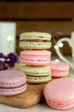 Macaroons and cup of coffee Stock Photos