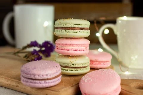 Macaroons and cup of coffee Stock Photos