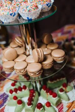 The macaroons are on the dessert rack. Stock Photos