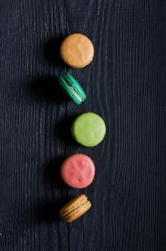 Macaroons biscuits in a row Stock Photos