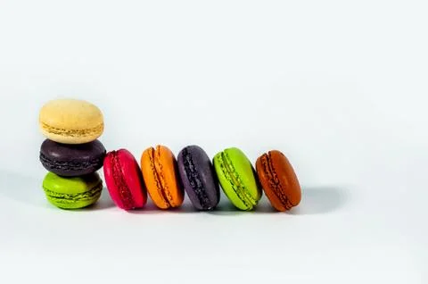 Macaroons on a blue plate Stock Photos