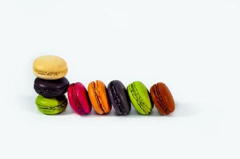 Macaroons on a blue plate Stock Photos