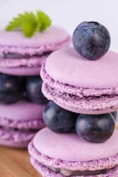 Macaroons with blueberries Stock Photos