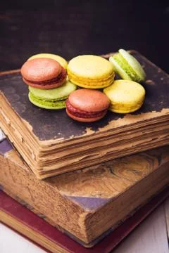 Macaroons on book Stock Photos