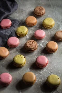 Macaroons on a gray background on a gray table Stock Photos