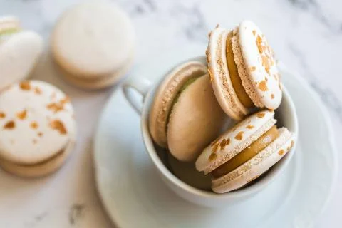 Macaroons, macaron cake in white cup Stock Photos