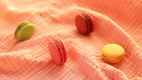 Macaroons with marshmallows on a pink background Stock Footage 168009648