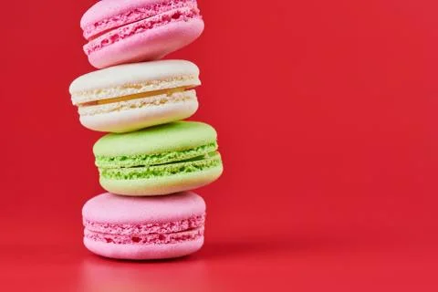 Macaroons on red background Stock Photos