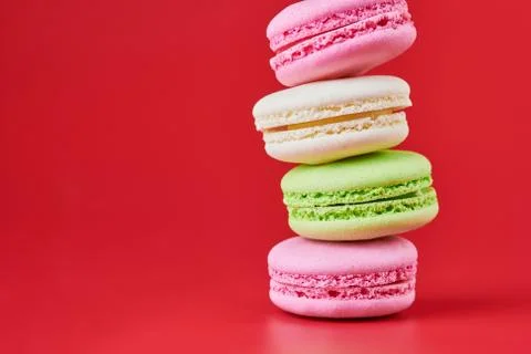 Macaroons on red background Stock Photos